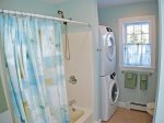 1st Floor Master Bathroom with tub/shower combination and Laundry Room